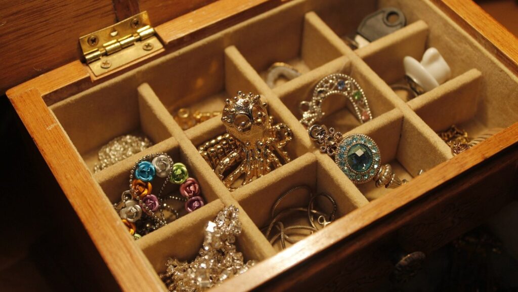 Jewelry pieces in a box.